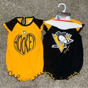 Two Pittsburgh Penguins onesies